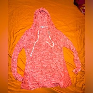 Kismet size small coral/orange color hoodie with lace bottom detailed sides